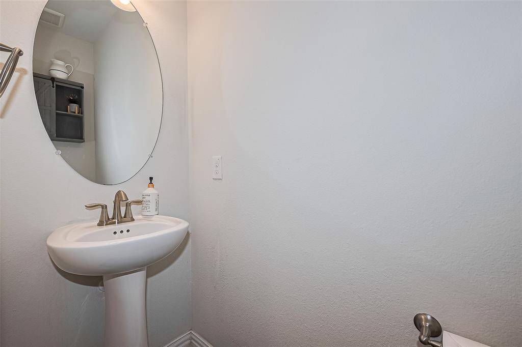 Chic and convenient powder room with stylish finishes