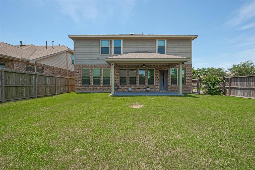 Whether you’re grilling for family and friends or enjoying peaceful evenings under the stars, this backyard is ready to be your favorite escape.