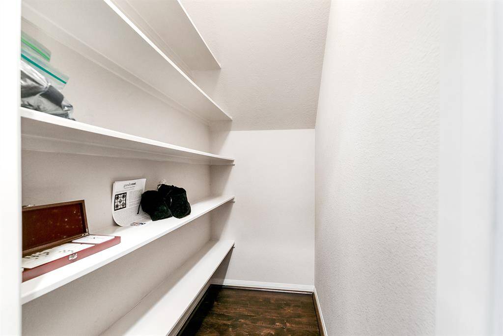 Upstairs features a large hall closet, providing excellent extra storage space. It’s perfect for keeping linens, seasonal items, or additional household essentials organized and easily accessible.