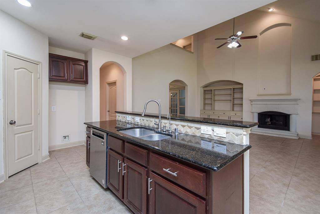 The kitchen opens to the living area.