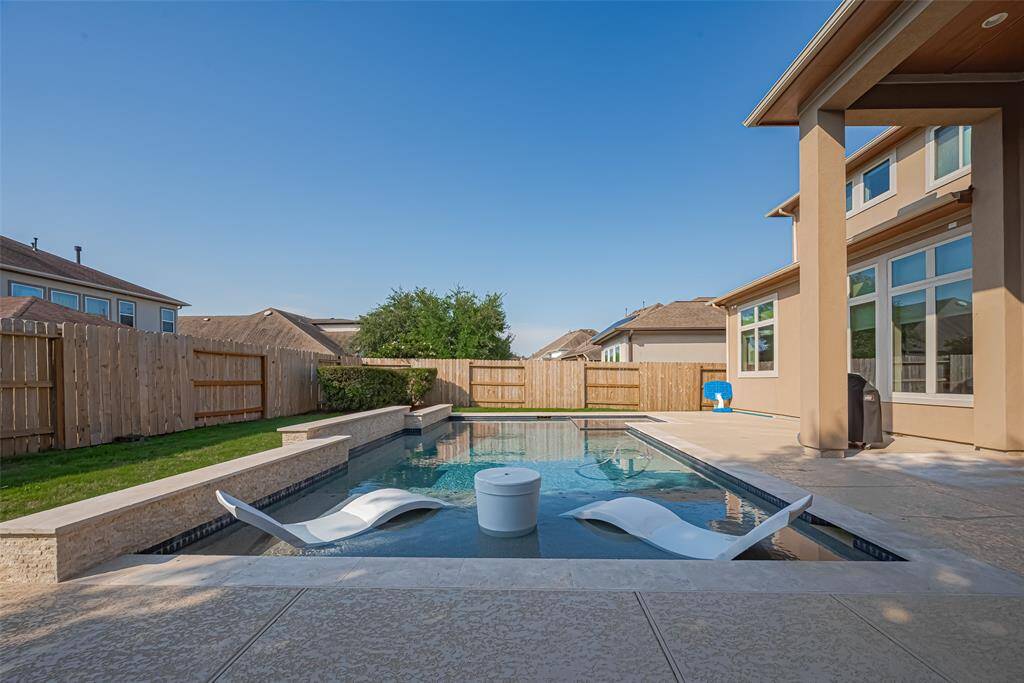 The sparkling pool invites you to cool off during  warm days!