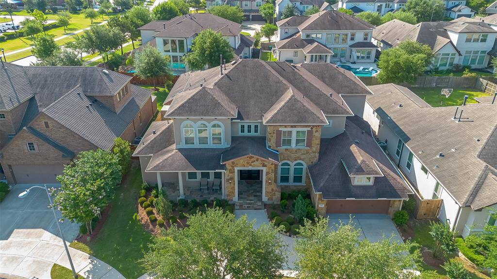An aerial view of the property reveals a well maintained landscaping.