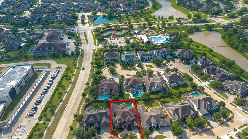 Community pool with slide, park and tennis court a block away from HOME!