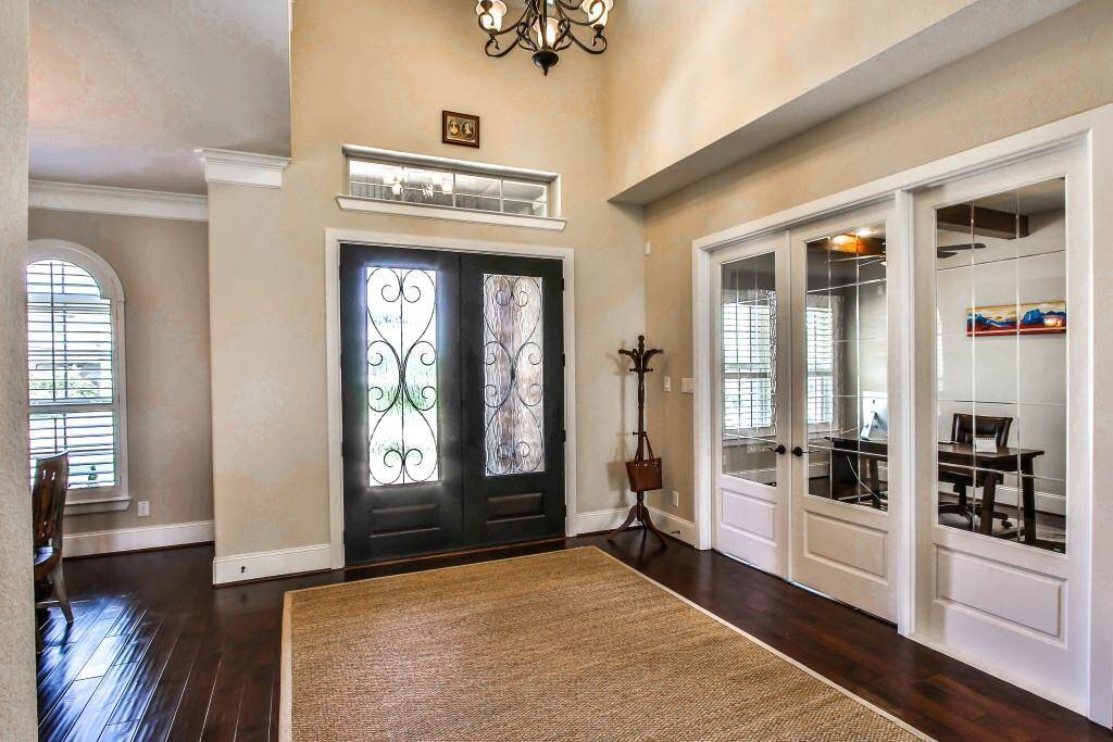 Spacious study with French doors.