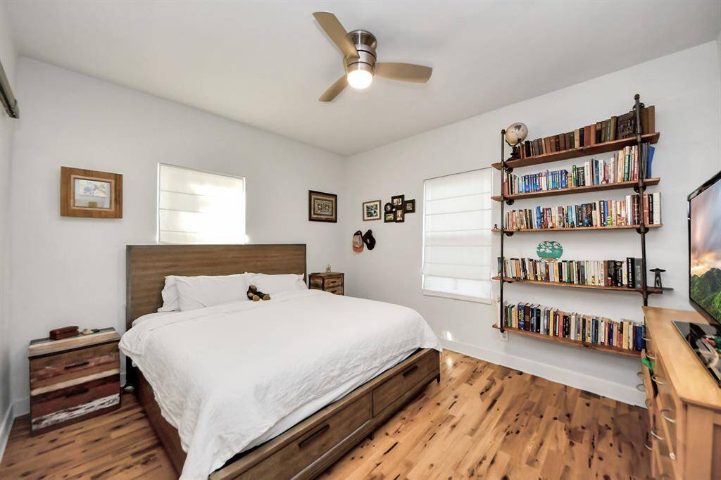 Wall-mounted bookshelf perfect for avid readers.