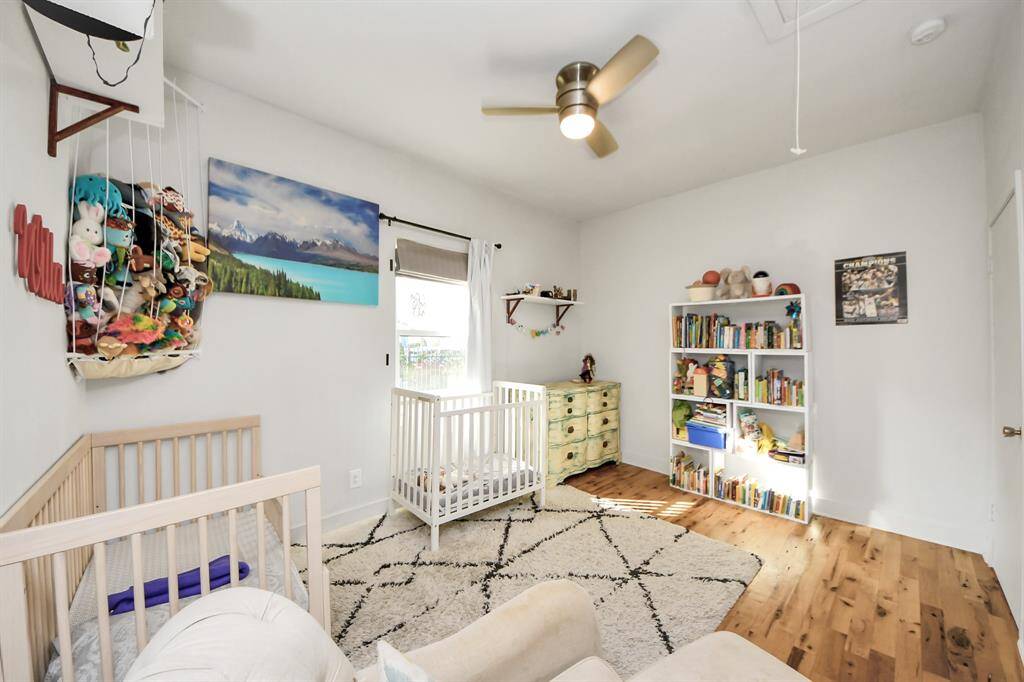 Unlike many homes in the area, the secondary bedrooms here are spacious and light-filled. The second bedroom in particular stands out—it’s much larger than what you typically find in similar homes, offering flexibility as a guest room, nursery, or work-from-home setup.