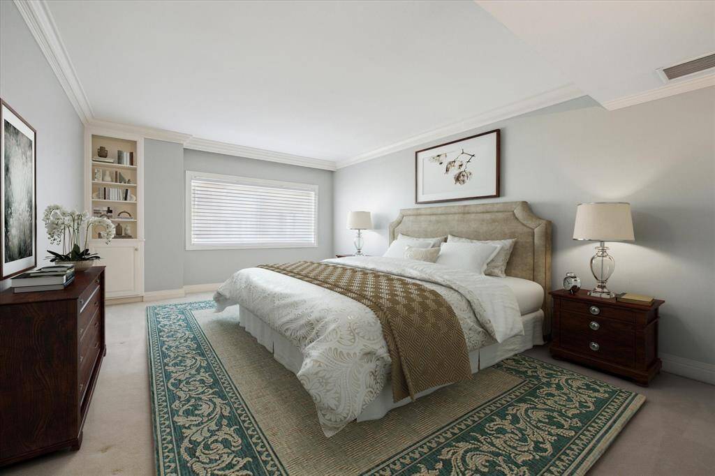 Primary Bedroom with carpet & Hunter Douglas window shade. Virtually Staged.