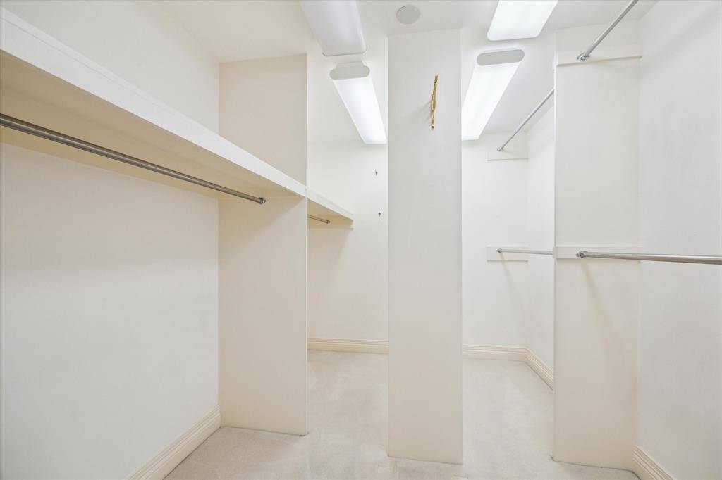 Primary Walk-in Closet. Approx ~9.5x8 ft.
