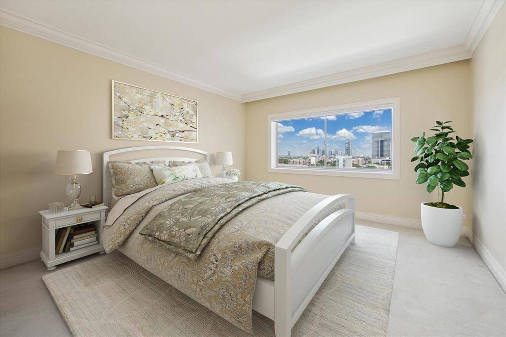 Bedroom 2 with carpet & window shade. Virtually Staged.