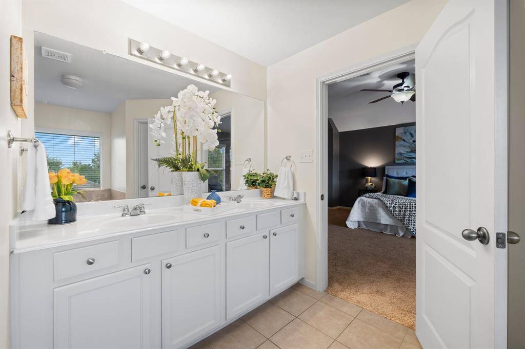 Another view of the vanity with double sinks.