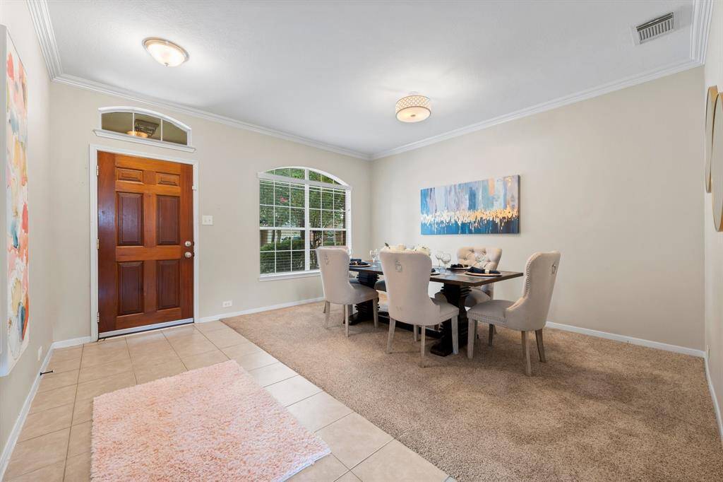 The formal dining room makes a great impression when entering the home.