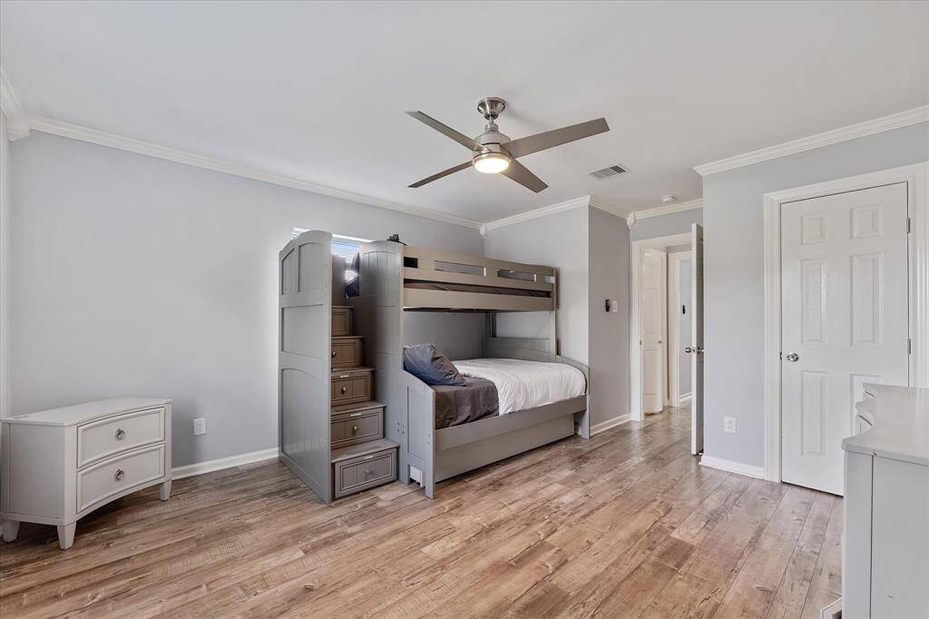 Another spacious bedroom with room to spare — perfect for guests, kids, or additional living space.
