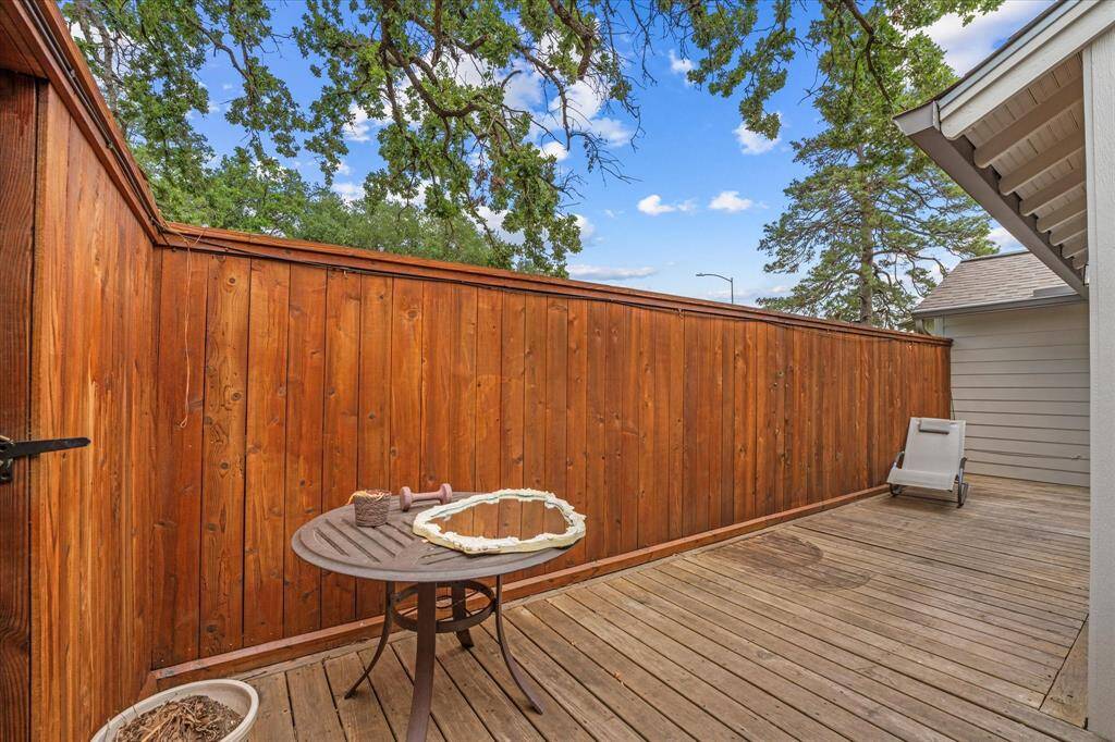 Step out onto the private porch off the primary suite — a peaceful spot perfect for morning coffee or unwinding in the evening.