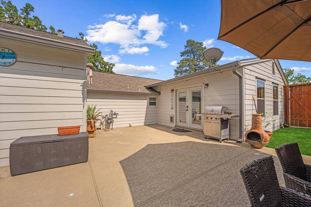 Step outside to a newly poured concrete deck with plenty of room to grill, lounge, and entertain — plus ample storage space to keep everything organized.