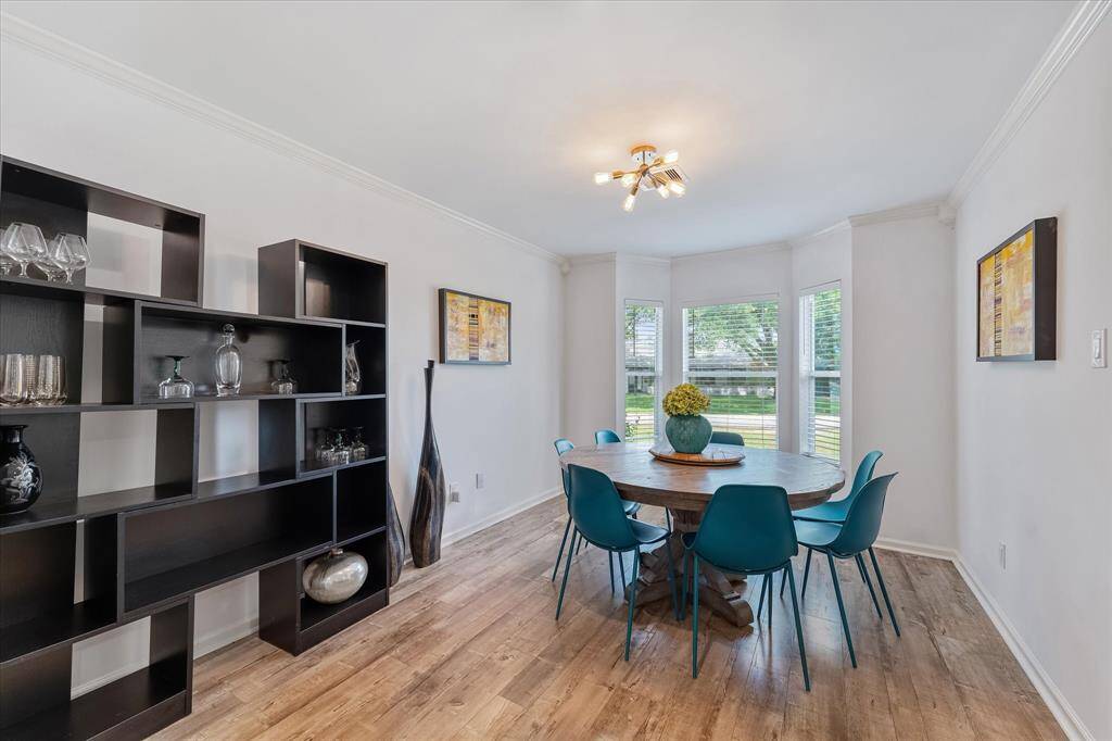 Whether it's a cozy breakfast or a formal dinner, the bay window dining area offers a bright, welcoming setting with beautiful natural light.