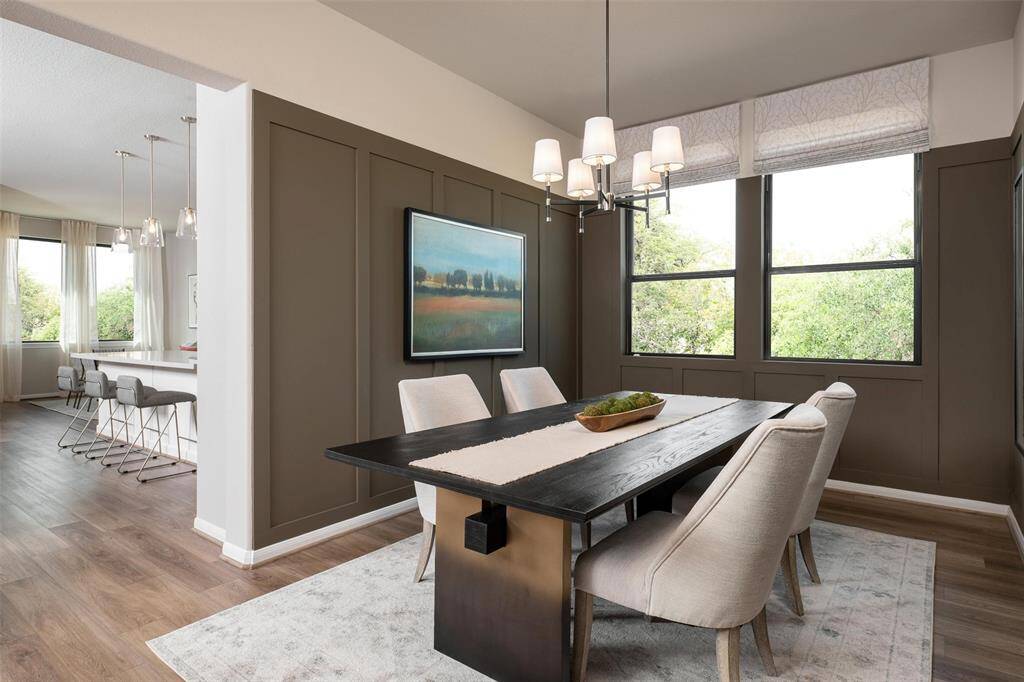 The dining area is a perfect blend of style and functionality, providing an inviting space for memorable meals and gatherings.