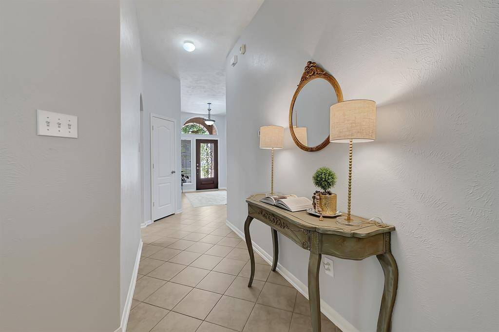 View of entry way, leading living.