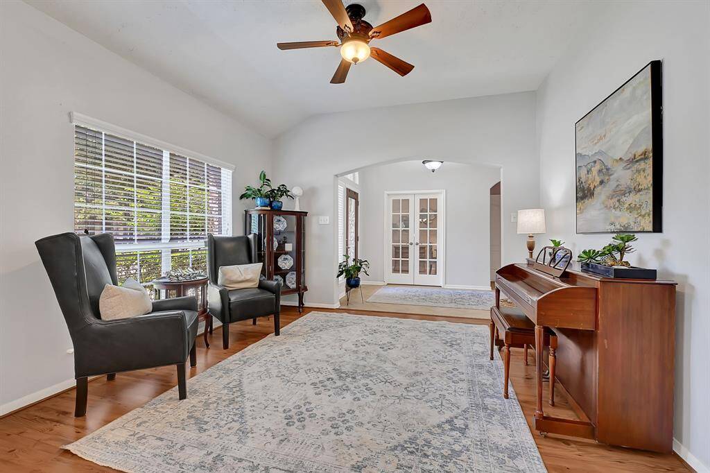 Another view of the formal living looking towards the entry and study. Closed off study can flex as a 4th bedroom if needed, complete with a closet.