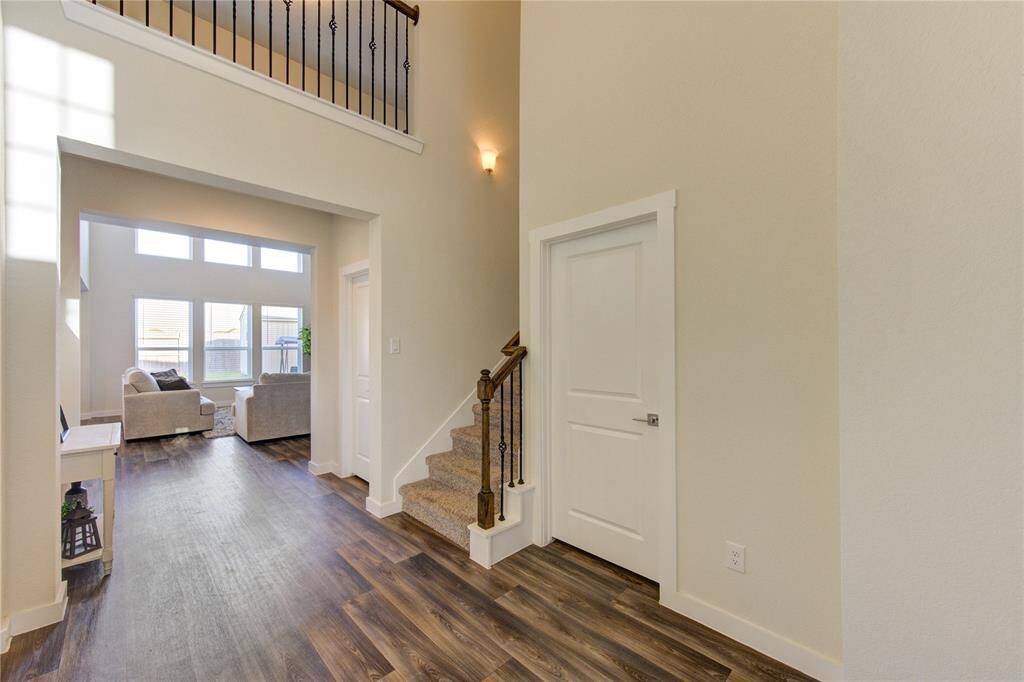 Enter the home to a large open concept space where you can overlook to the bottom floor.