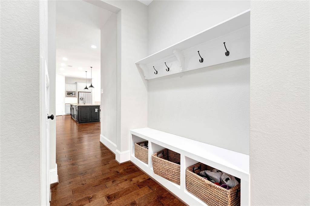 Custom shoe bench, extra storage, and hanging hooks with shelf