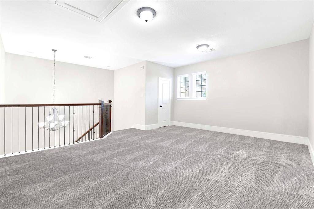 Upgraded stair railing leads you to flex space