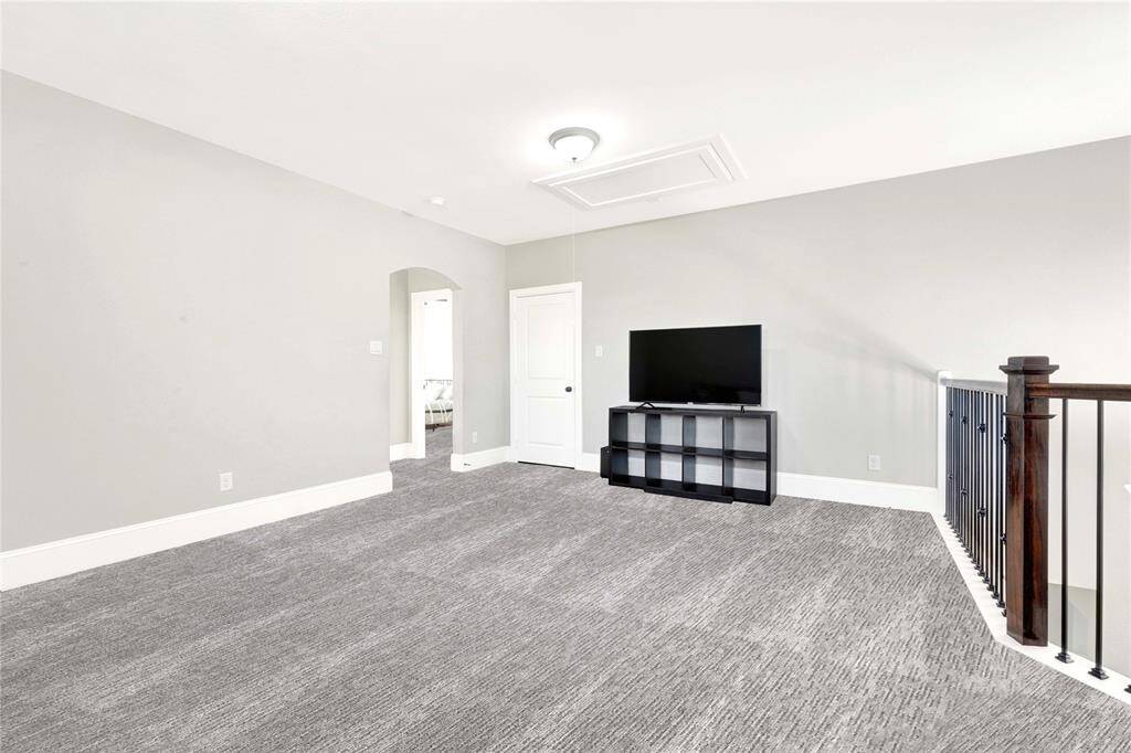 Flex space is between two large secondary bedrooms