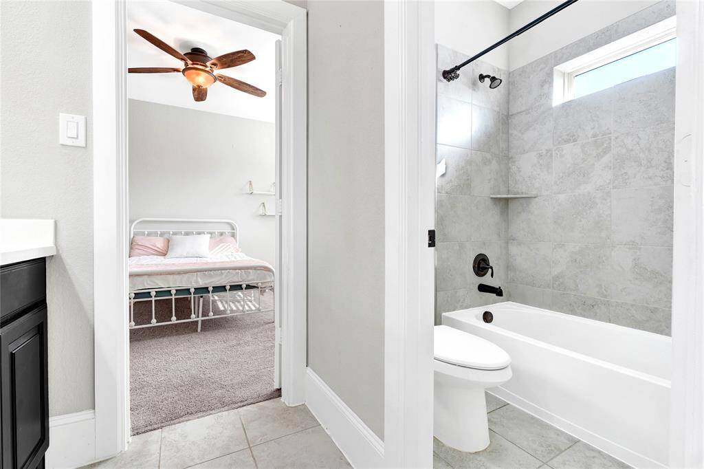 Private shower and toilet area with door