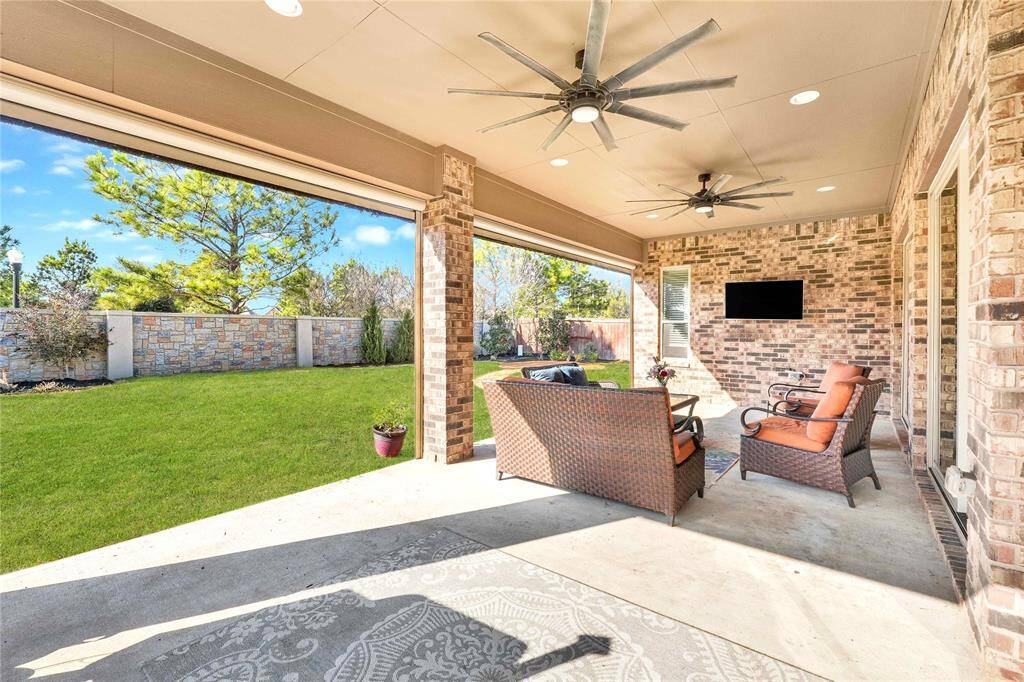 Fully equipped extended outdoor patio with outlets, gas connections, and upgraded fans