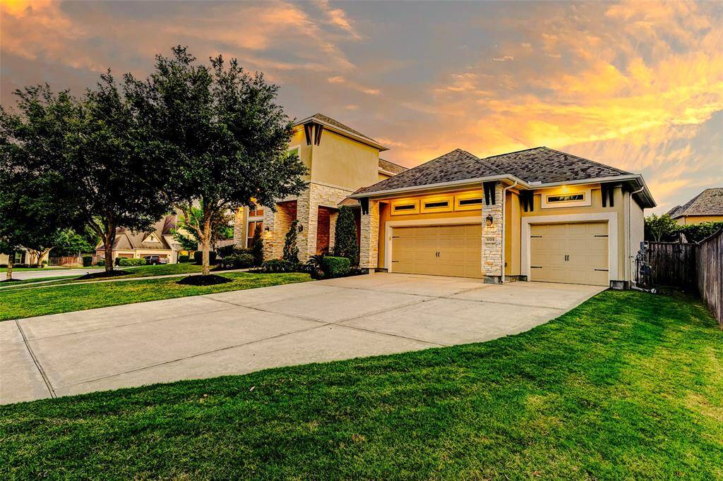 This exceptional home offers four spacious bedrooms and four and a half beautifully appointed bathrooms!