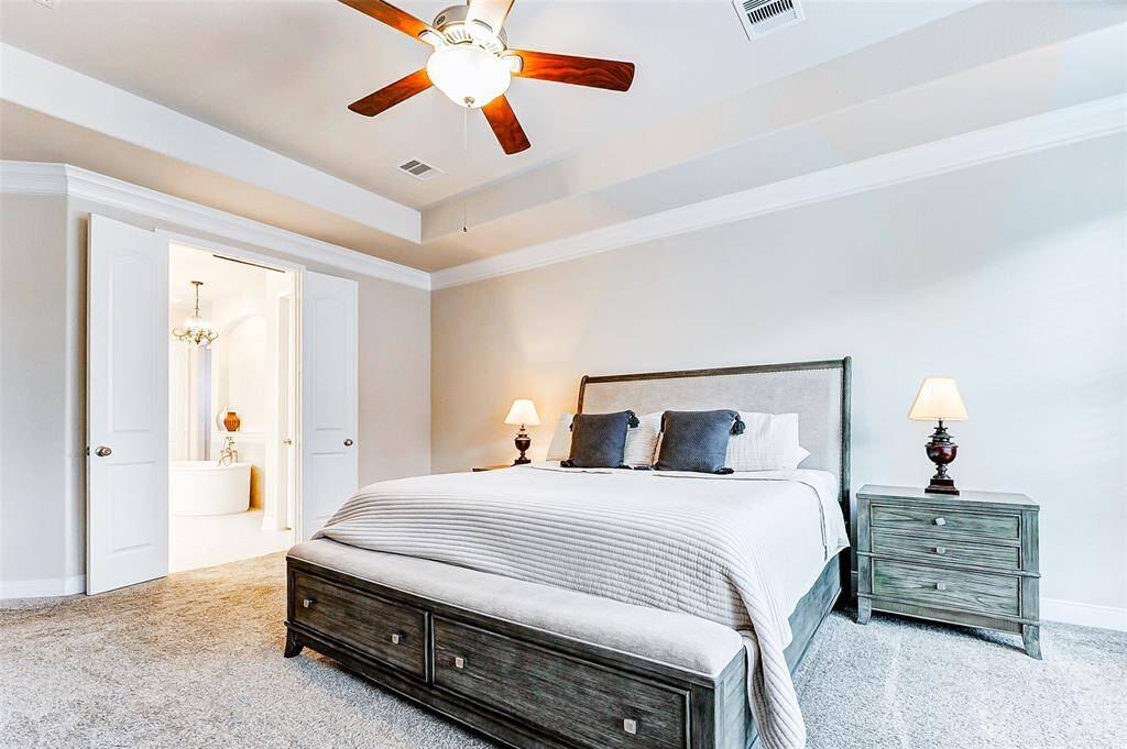 Anchored by plush carpeting,this generously sized bedroomcomfortably accommodates aking-size bed, offering a perfectsanctuary for relaxation andrestful nights.