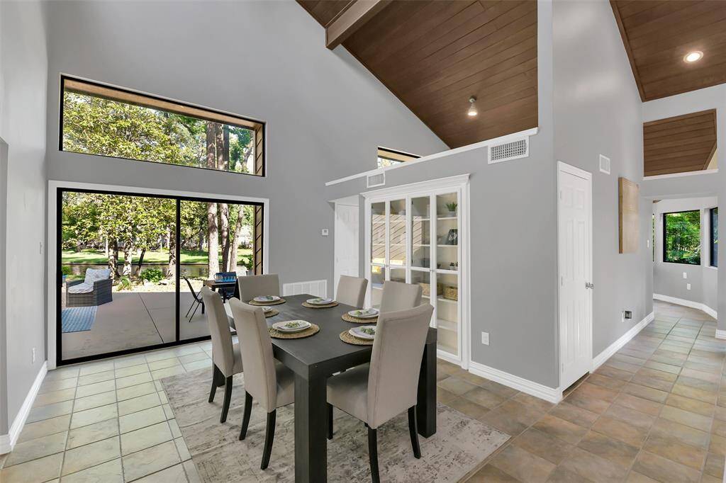 Dining Area with a lovely view of the lake - off the family room and Patio Area