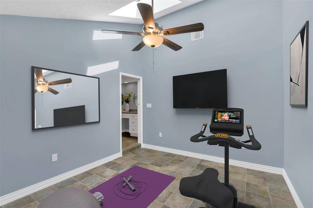 Flex Room off the Primary Bath - Great room for a gym or 2nd Study - there is a pocket door leading into the flex room