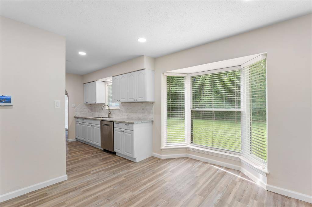 Recently installed double paned widows throughout the home encourages natural light.