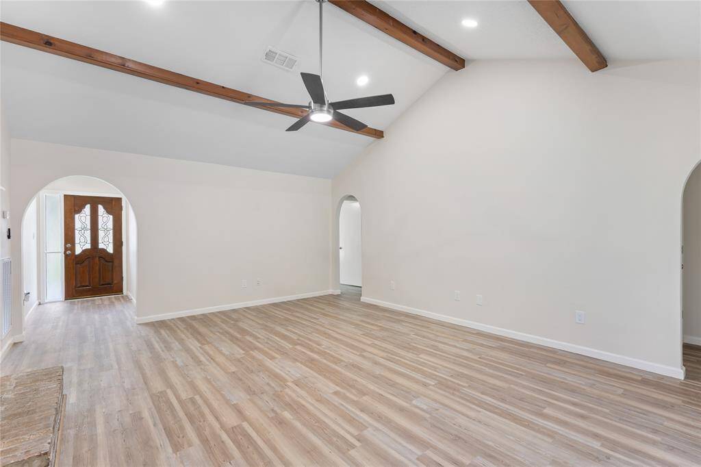Wood beam accents & recess lighting.