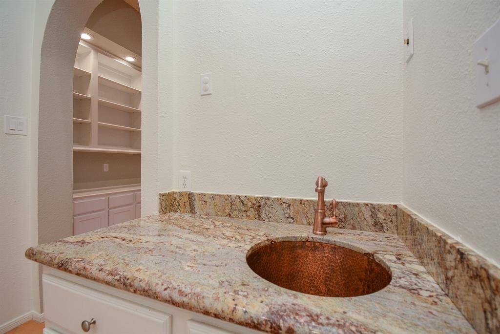 Bonus elegant copper sink.  You can use this as a coffee station or bar