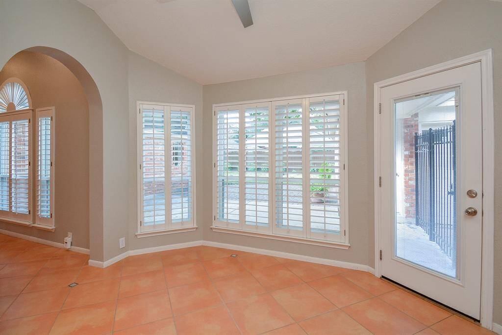 Breakfast area has plenty of light and views to the backyard