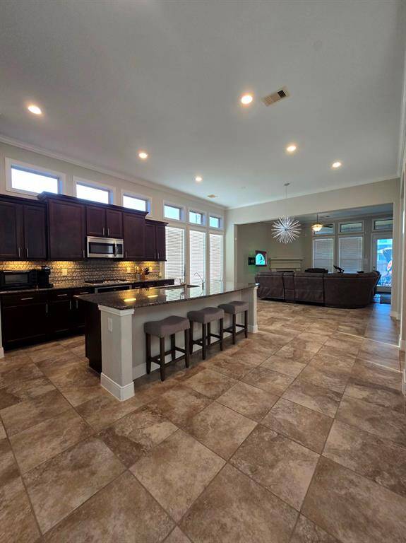 Step into the heart of the home! This upgraded kitchen and open concept is perfect for entertaining and creating lasting memories. Ready to make it yours?