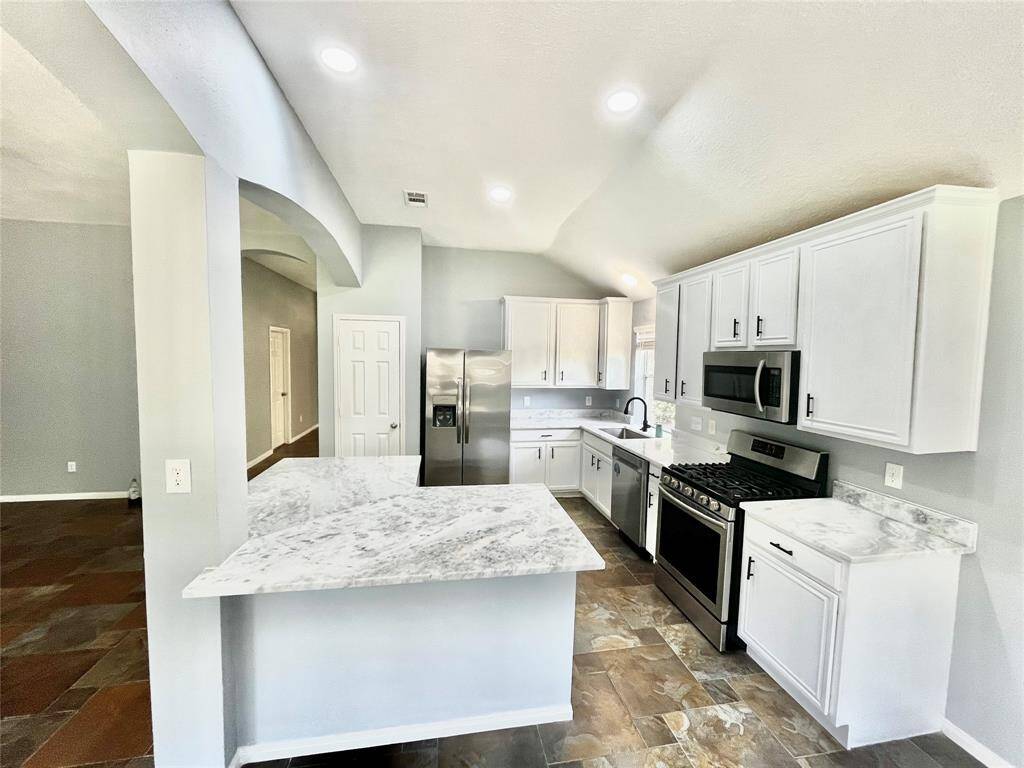 new hardware, granit countertops, dishwasher sink and fauset