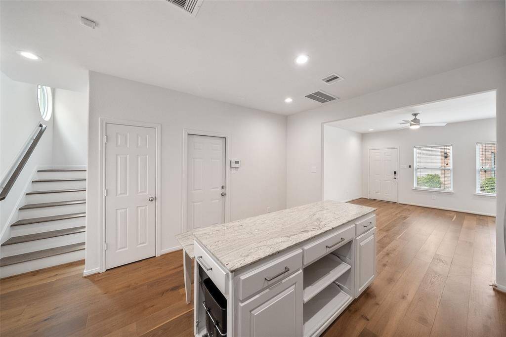 This view highlights the abundant storage offered in the island.