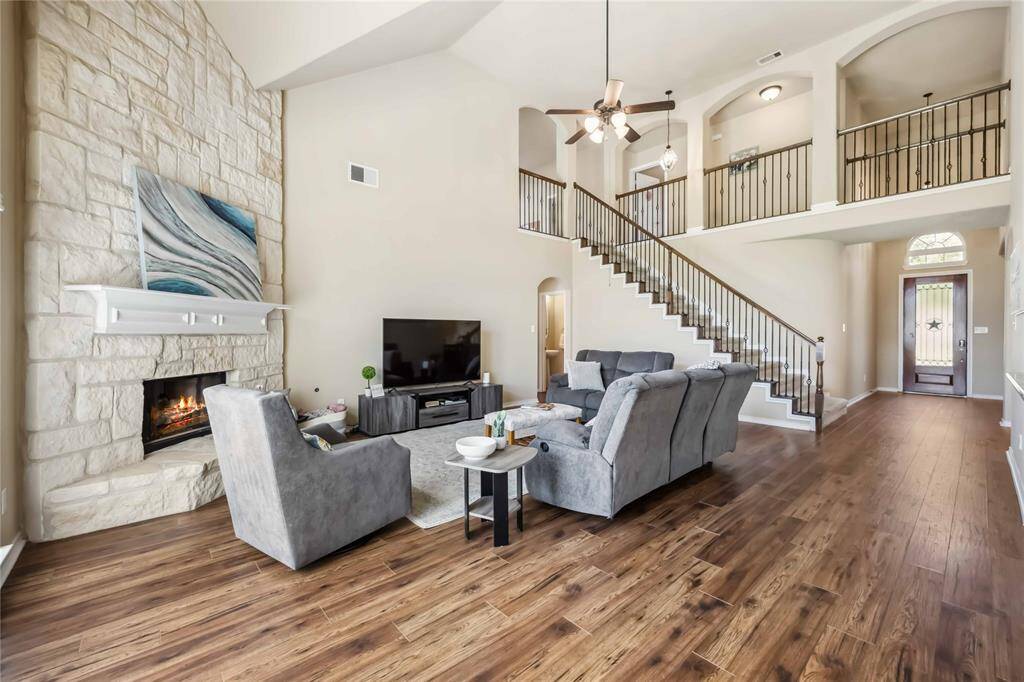 Freshly painted downstairs really makes the home light and bright. Stunning catwalk to the secondary uptairs bedrooms.  Gas fireplace and gas logs!