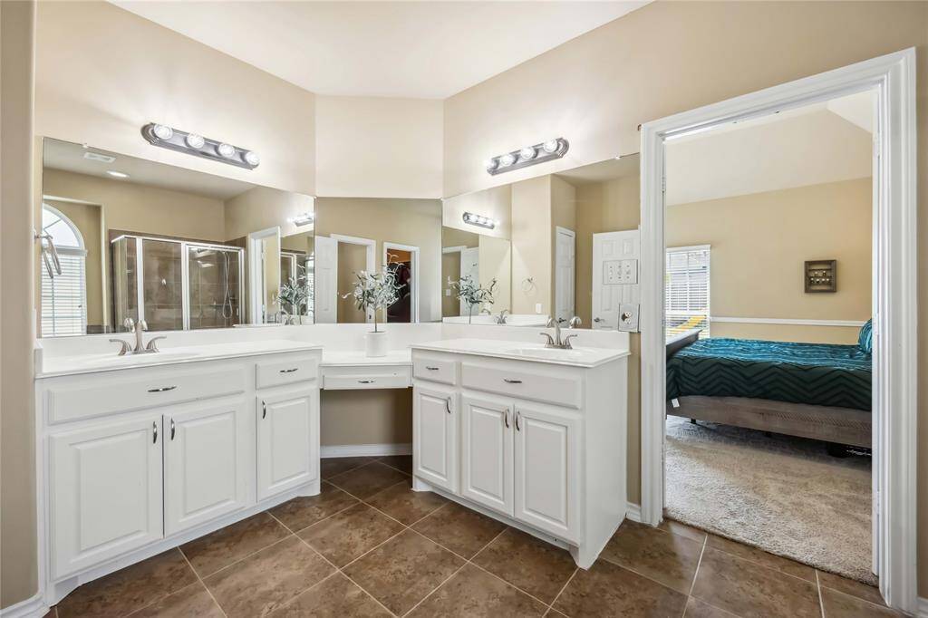 Dual vanities and sinks making it easy for everyone to stay in their lane.  :)