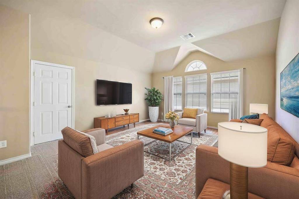 Upstairs secondary living space virtually staged.  Currently being used as the kids playroom.