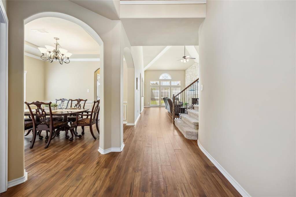 Arched entries and tall ceilings really take your breath away.