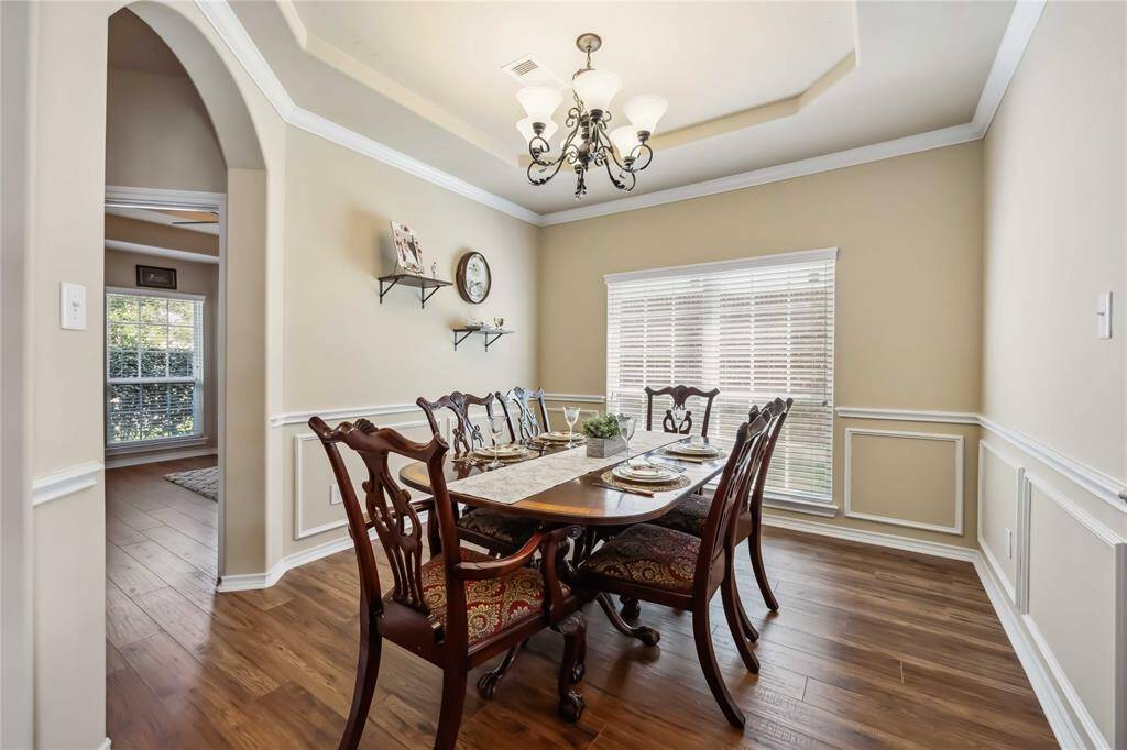 Dining room adjoined to the coffee bar and kitchen.  Recessed ceilings and lots of light.