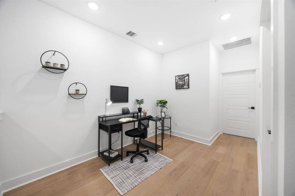 Second floor flex space ideal for a home office, game room, TV area... you name it!