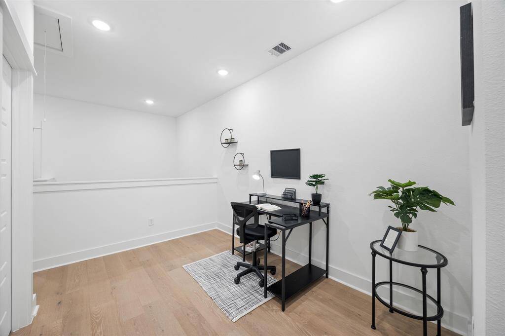 Second floor flex space ideal for a home office, game room, TV area... you name it!