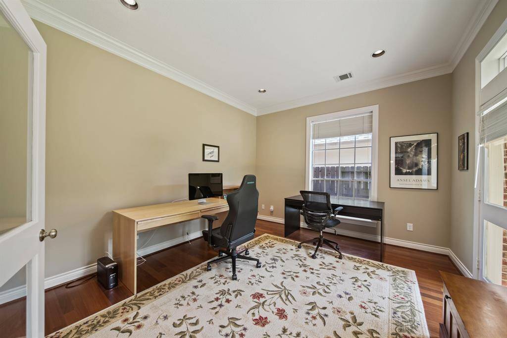 Large Home Office / Study Located at the Rear of the Home Off the Family Room with Double Doors for Privacy.