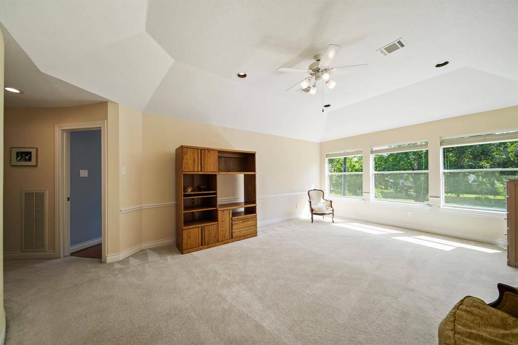 Game Room has Door Leading to Rear Balcony.