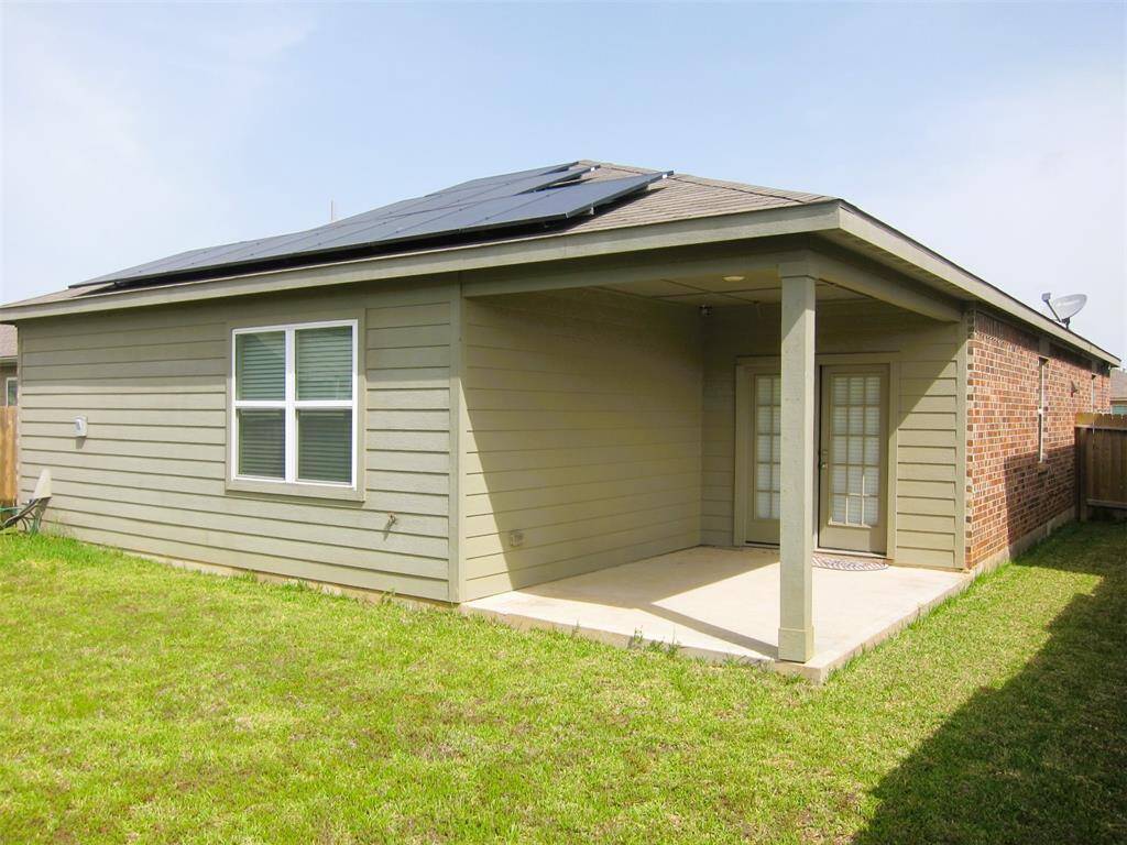 This homy home features photovoltaic (PV) panels, elegantly placed on the roof, devices enabling the home to convert sunlight into electricity. They utilize photovoltaic cells, which are made of materials that produce excited electrons when exposed to light, causing them to flow through a circuit and generate electricity, automatically lowering your monthly bill.