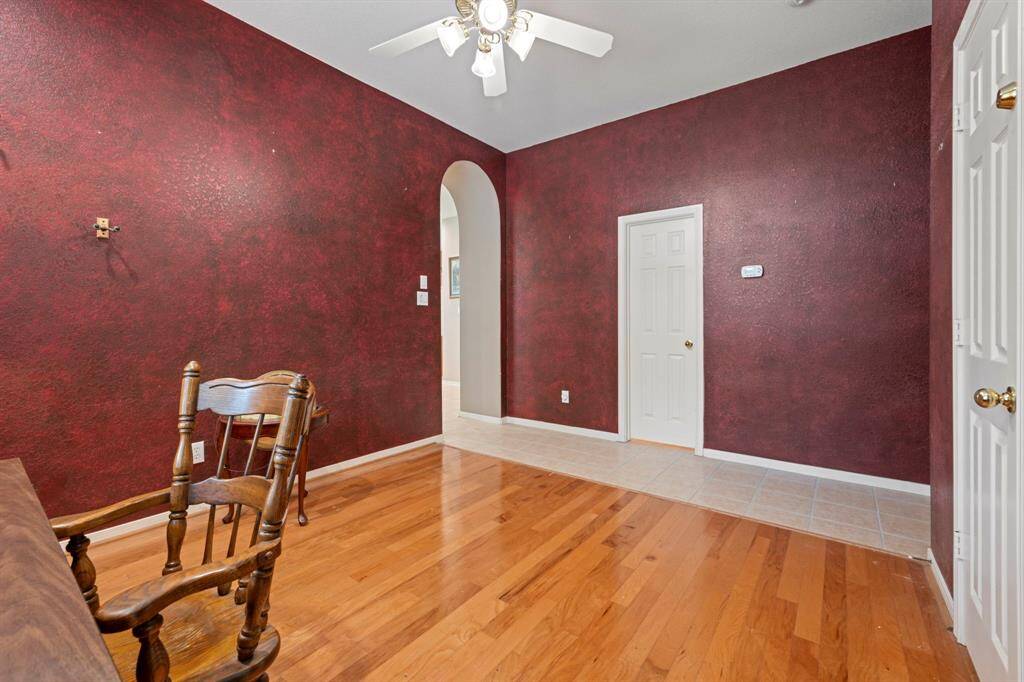 This versatile room offers endless possibilities—ideal for a home office, cozy reading nook, or creative studio.